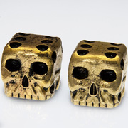 Brass Skull Dice Pair