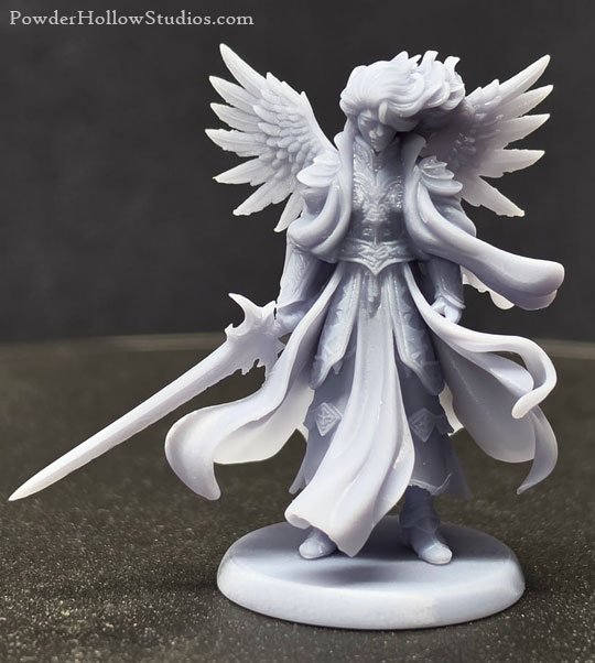 Unpainted Angelic Guardian miniature with feathered wings, armor, flowing robes, and sword